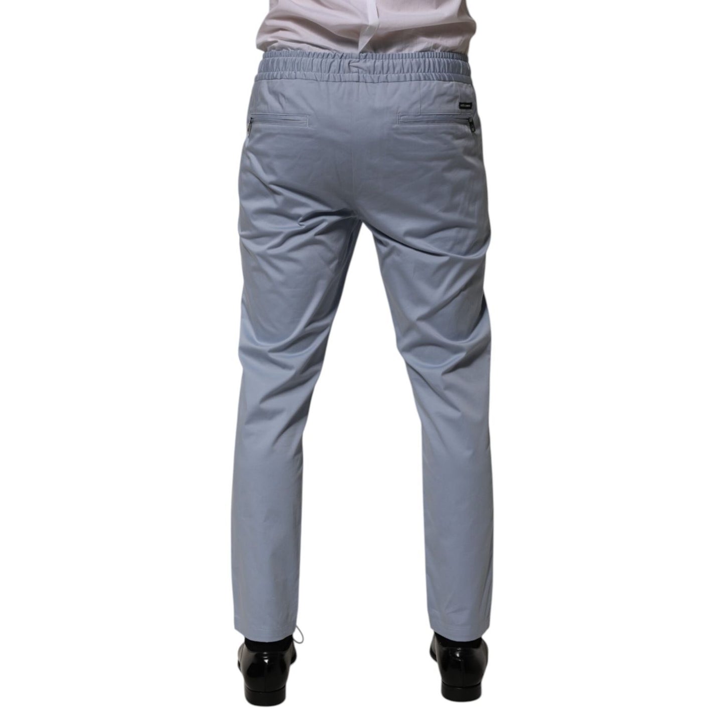 Dolce & Gabbana Light Blue Cotton Drawstring Elastic Waist Men Pants shown from the back with elastic waistband and slim fit.