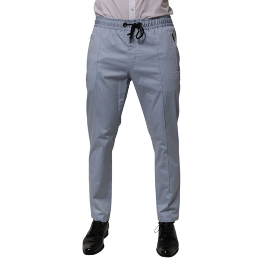Dolce & Gabbana Light Blue Cotton Drawstring Elastic Waist Men Pants with slim tailored fit, shown with black shoes and white shirt.