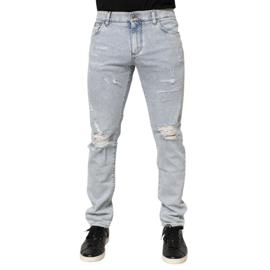 Dolce & Gabbana Light Blue Distressed Slim Fit Ripped Denim Jeans showcasing trendy ripped design and slim straight leg cut.