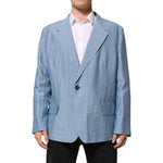 Model wearing Dolce & Gabbana Light Blue Linen Double Breasted Men Jacket Blazer, featuring a relaxed fit and luxury design.
