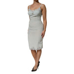 Dolce & Gabbana Light Blue Silk Lace Midi Bodycon Slip Dress with lace details and DG logo, model standing wearing dress on white background