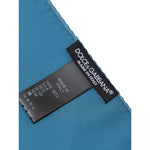 Dolce & Gabbana Light Blue Silk Pocket Square with label showing 100% silk composition.