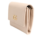 Dolce & Gabbana Light Pink Calf Leather DG Logo French Flap Wallet with gold-tone logo and snap closure