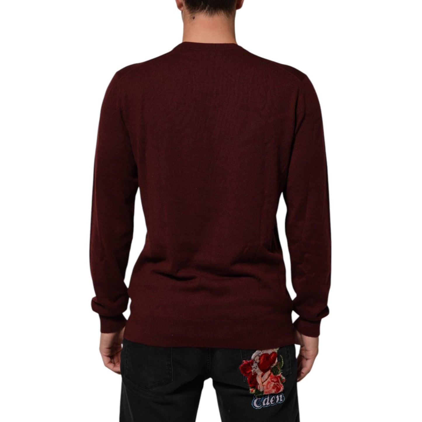 Back view of Dolce & Gabbana Maroon Cashmere Crew Neck Pullover Sweater with ribbed hem and cuffs.