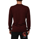 Back view of Dolce & Gabbana Maroon Cashmere Crew Neck Pullover Sweater with ribbed hem and cuffs.