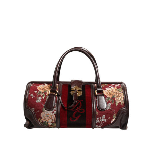 Dolce & Gabbana Multicolor Leather Jacquard Velvet Travel Duffle Bag with floral design and logo engraved hardware.