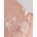 Close-up of Dolce & Gabbana Pink Acetate High Waist Shorts Panty Underwear, showcasing soft fabric and delicate stitching.
