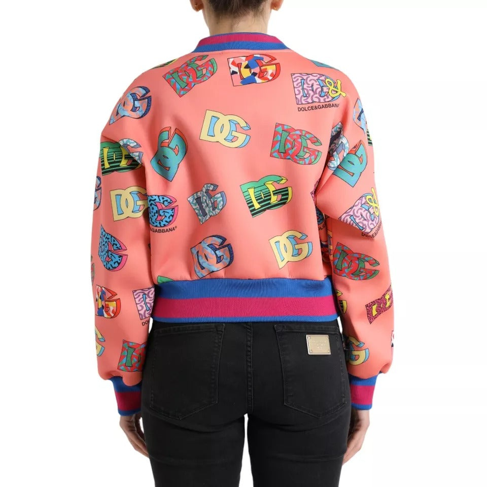 Dolce & Gabbana Salmon Pink Logo Print Sweatshirt Sweater with multicolor logos, crew neck, long sleeves, shown from the back.