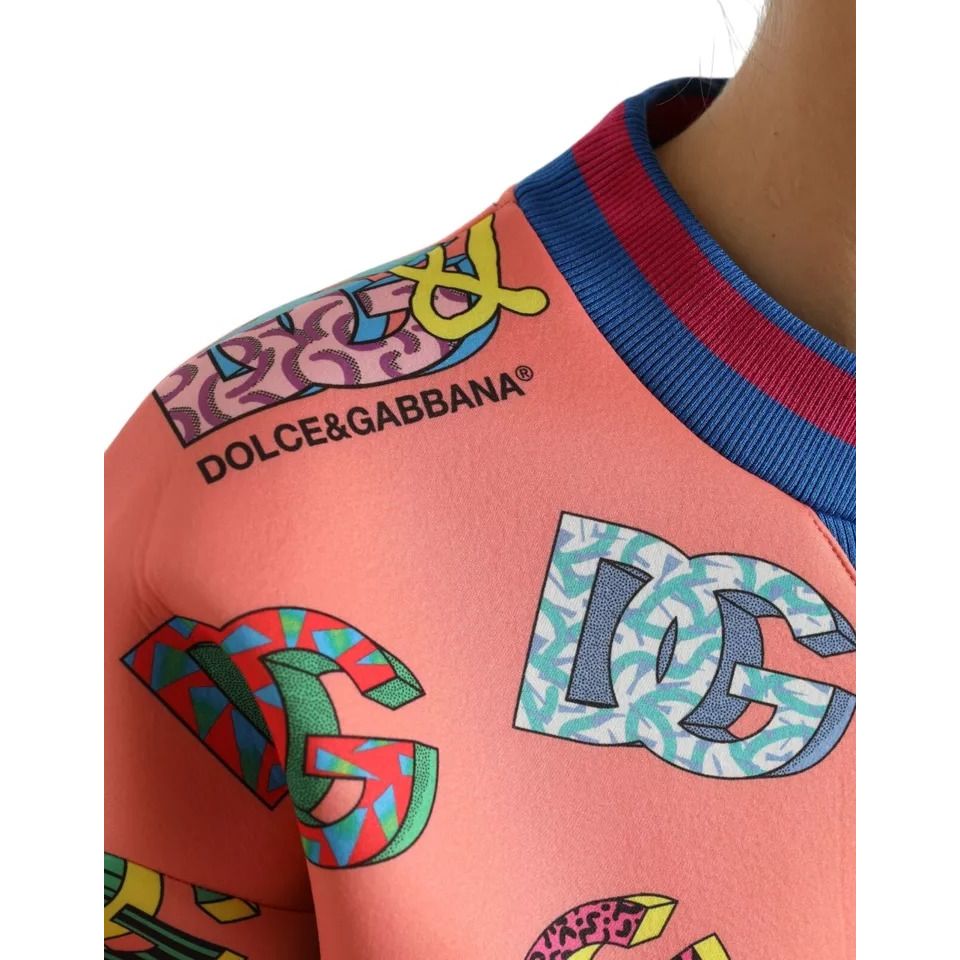 Dolce & Gabbana Salmon Pink Logo Print Sweatshirt Sweater with multicolor logos and crew neck, made in Italy.