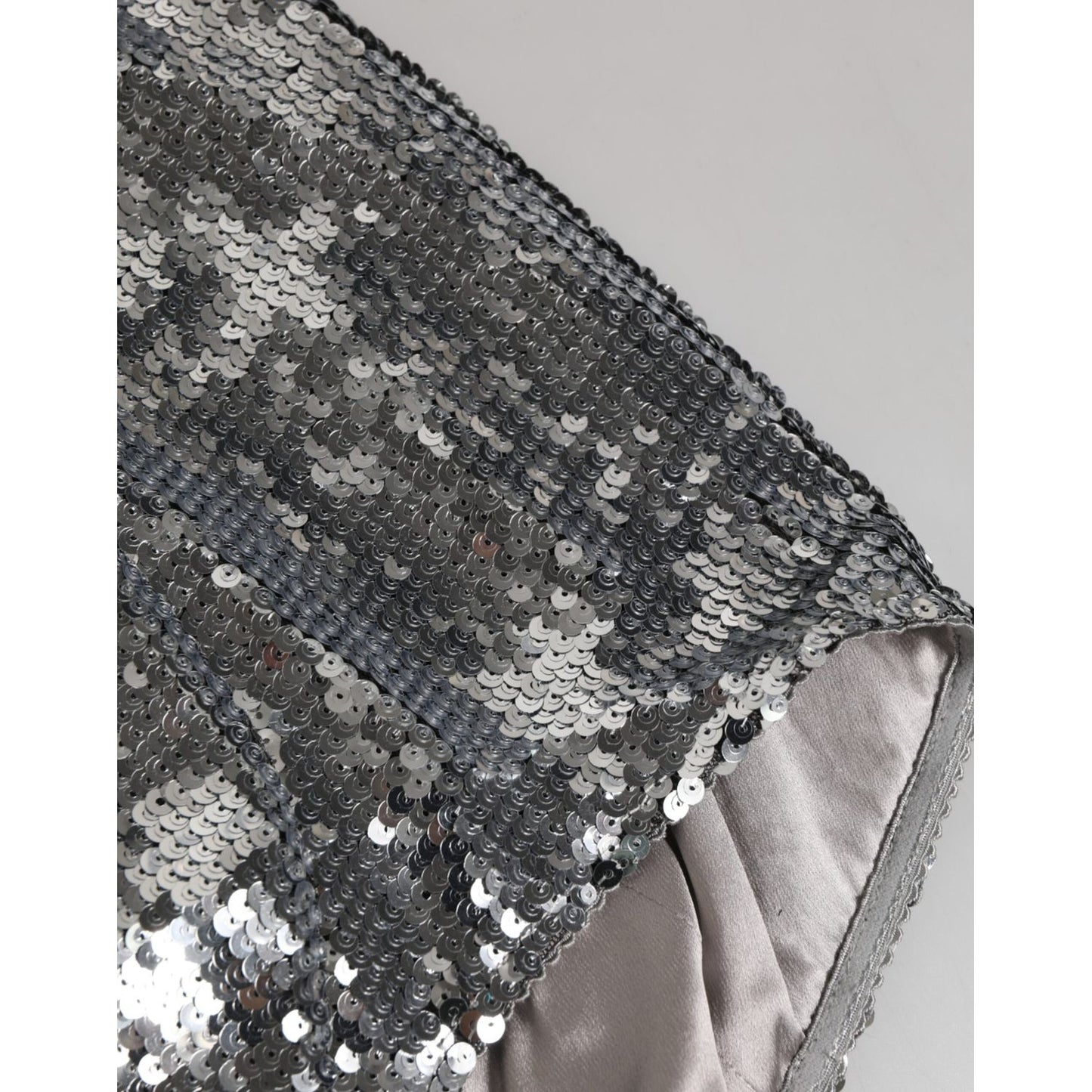 Close-up of Dolce & Gabbana Silver Nylon Sequined Slip Girdle Panty Underwear with shimmering sequins and detailed stitching.