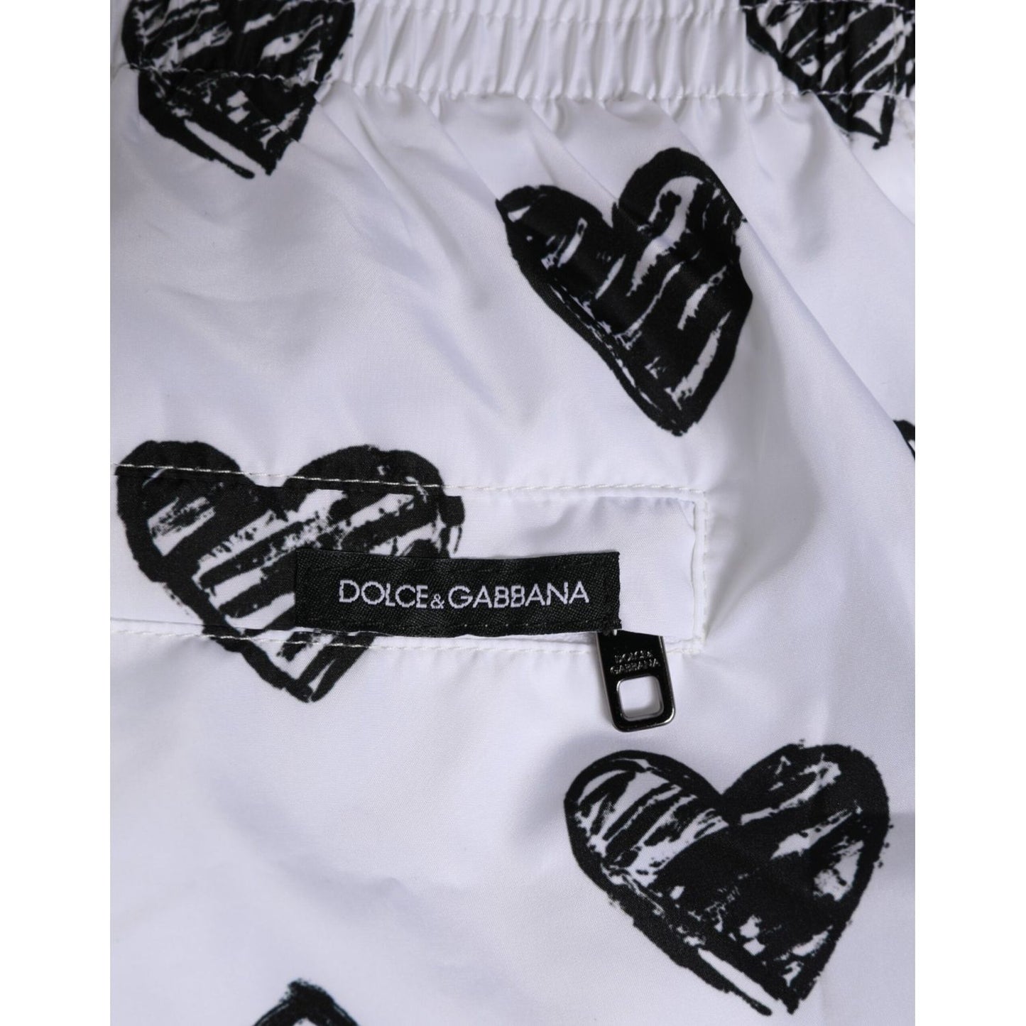 Dolce & Gabbana White Black Heart Print Men Boxer Short Swimwear with elastic waistband and DG logo detail.