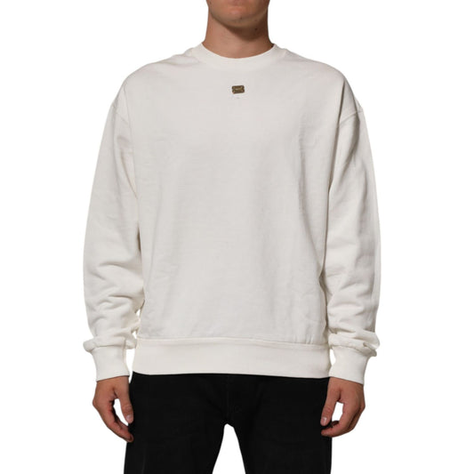 Man wearing Dolce & Gabbana White DG Logo Crew Neck Sweatshirt Sweater with ribbed hem, cuffs, and logo plaque detail.