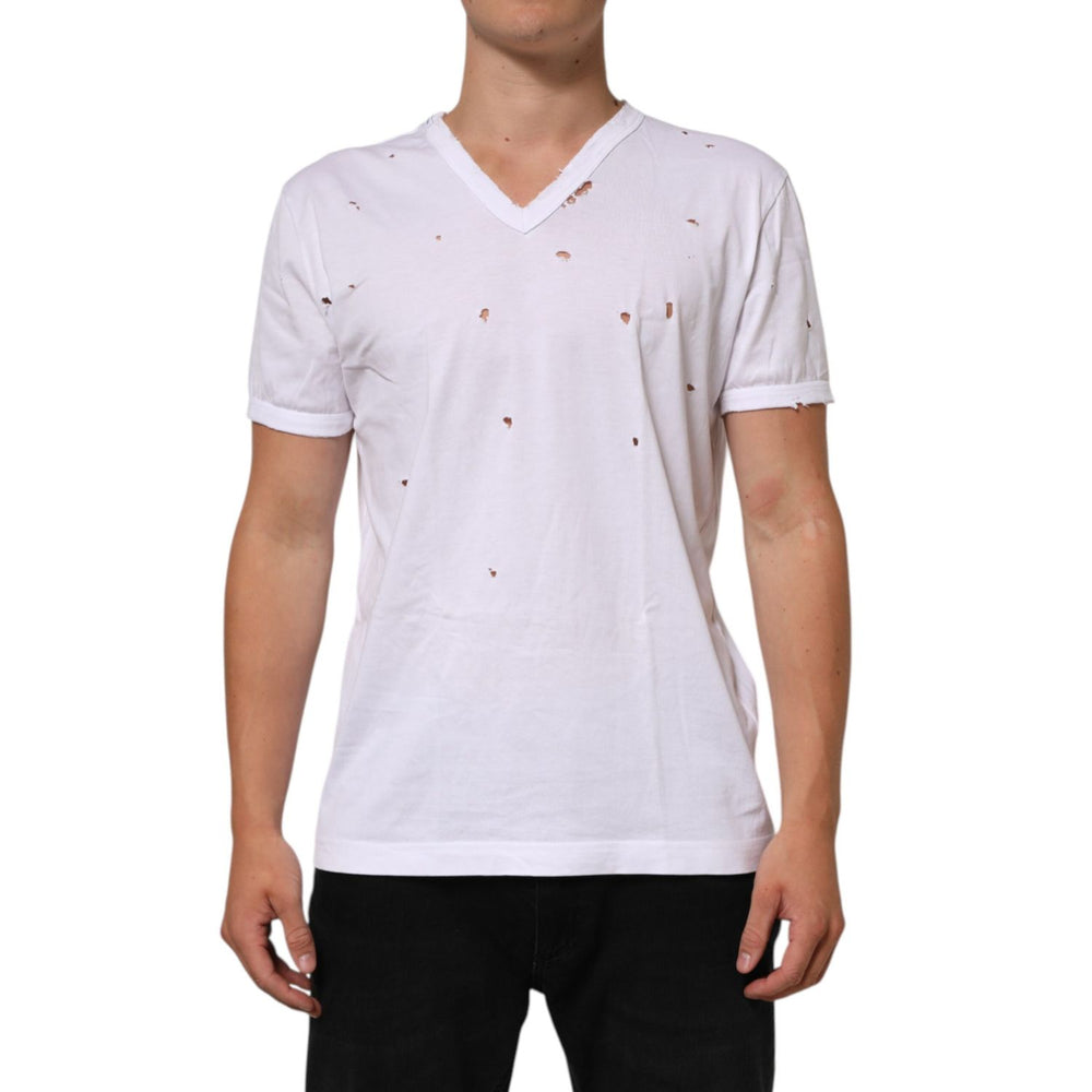 Dolce & Gabbana White Distressed Cotton V Neck Men T-shirt featuring a modern worn-in look, short sleeves, and classic Italian style.