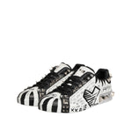 Dolce & Gabbana White Portofino Studded Men Sneakers Shoes with black graphics and studded embellishments displayed on white surface