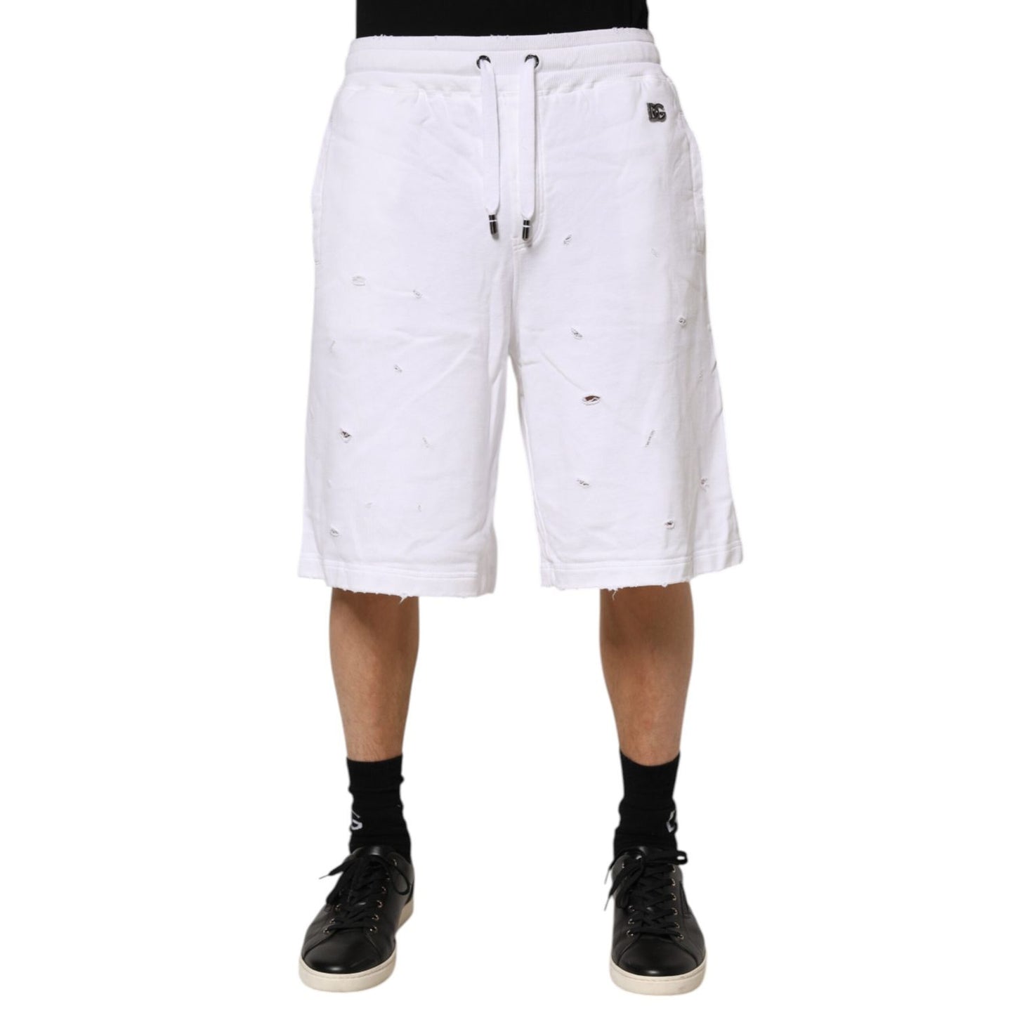 Dolce & Gabbana White Ripped Mid Waist Casual Bermuda Short on model, showcasing trendy ripped details, ideal for summer fashion.
