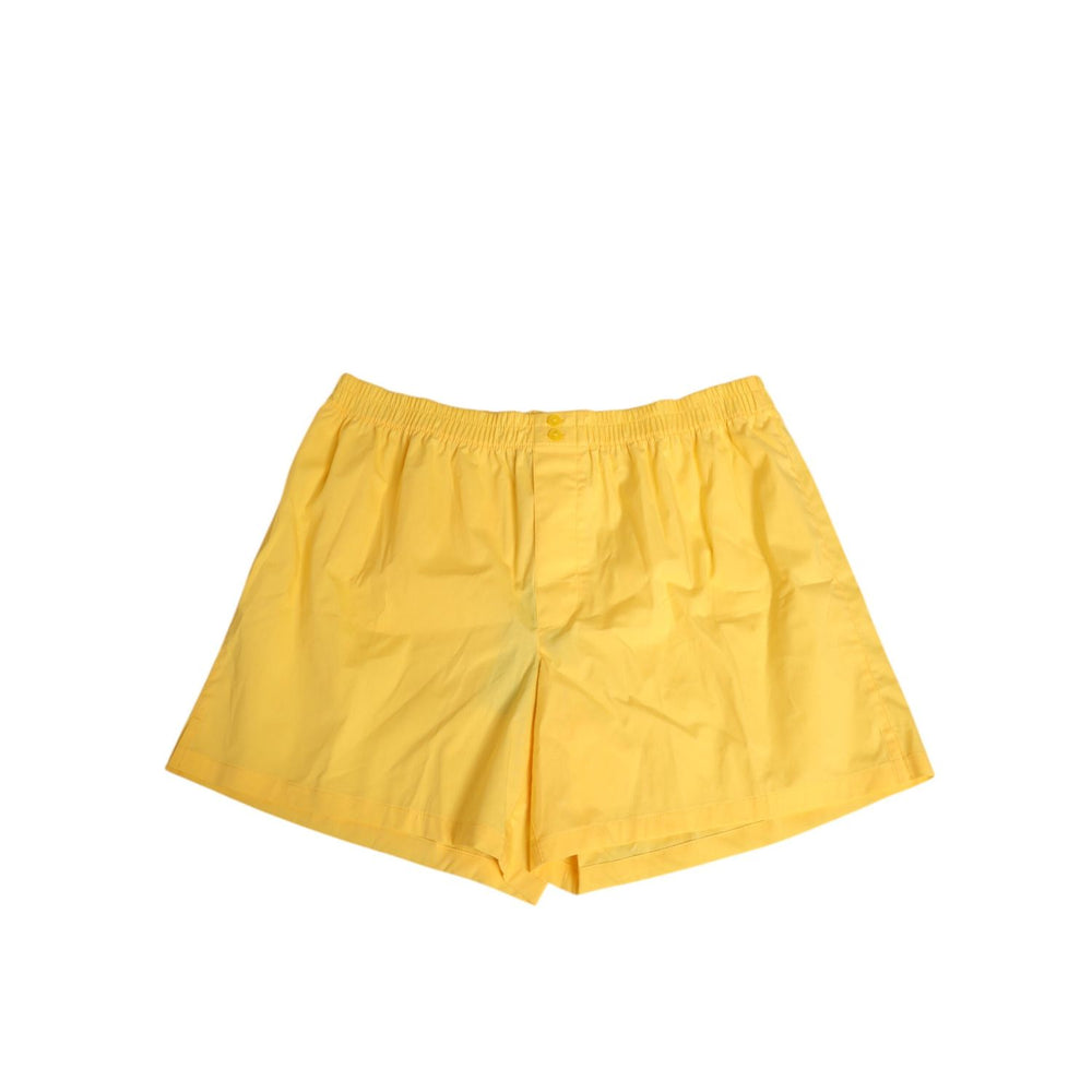 Dolce & Gabbana Yellow Cotton Elastic Waistband Short Swimwear with button closure and logo detail, made in Italy.
