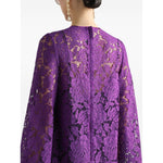 Back view of Dolce & Gabbana bell sleeves Lace mini dress in amethyst purple showing lace detail and rear zip fastening.