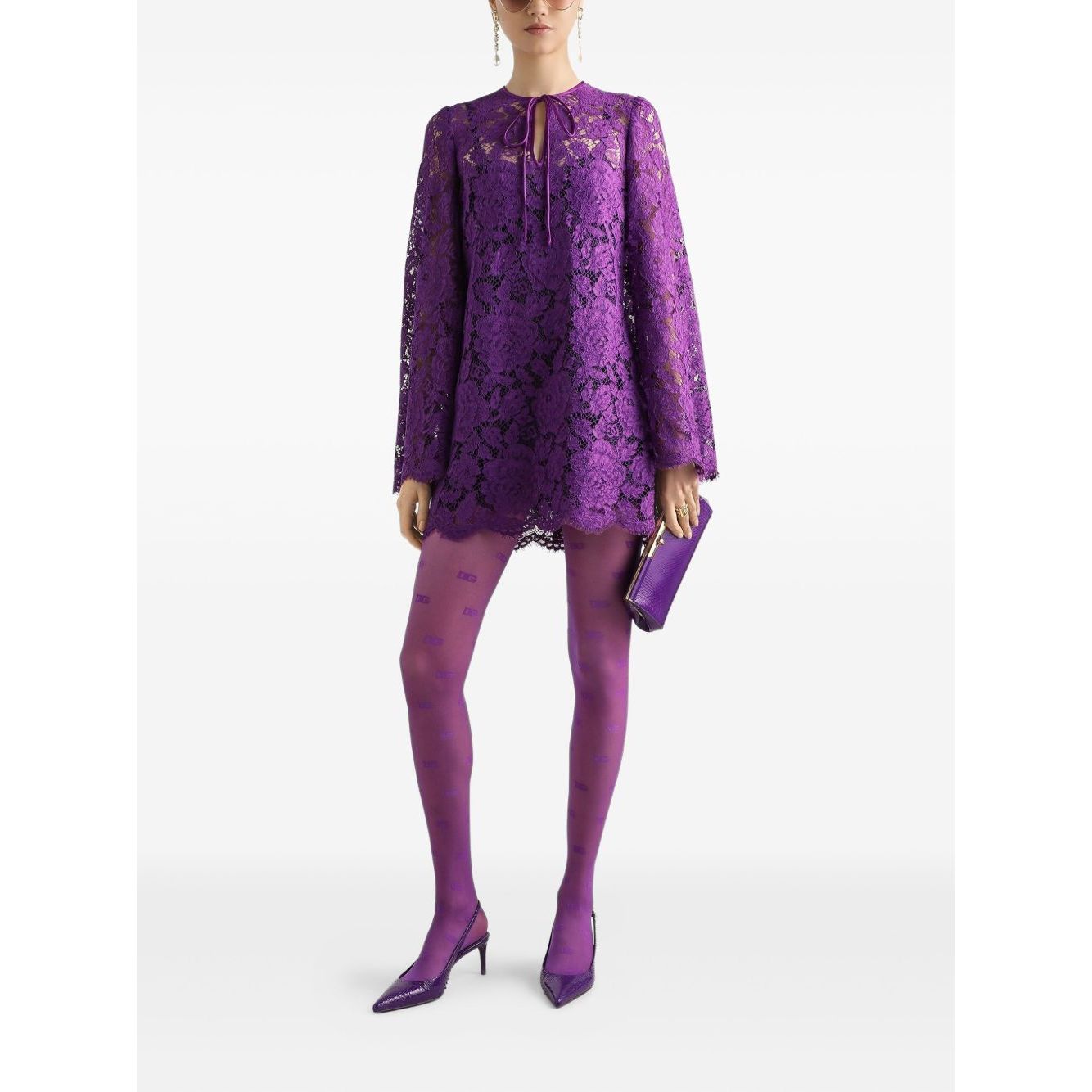 Dolce & Gabbana bell sleeves Lace mini dress in amethyst purple with crew neck and front tie, featuring a rear zip fastening.