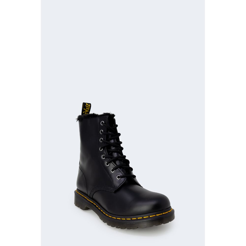 Dr. Martens Black Leather Boot with lace-up design and rubber sole, showcasing iconic style and comfort for women.