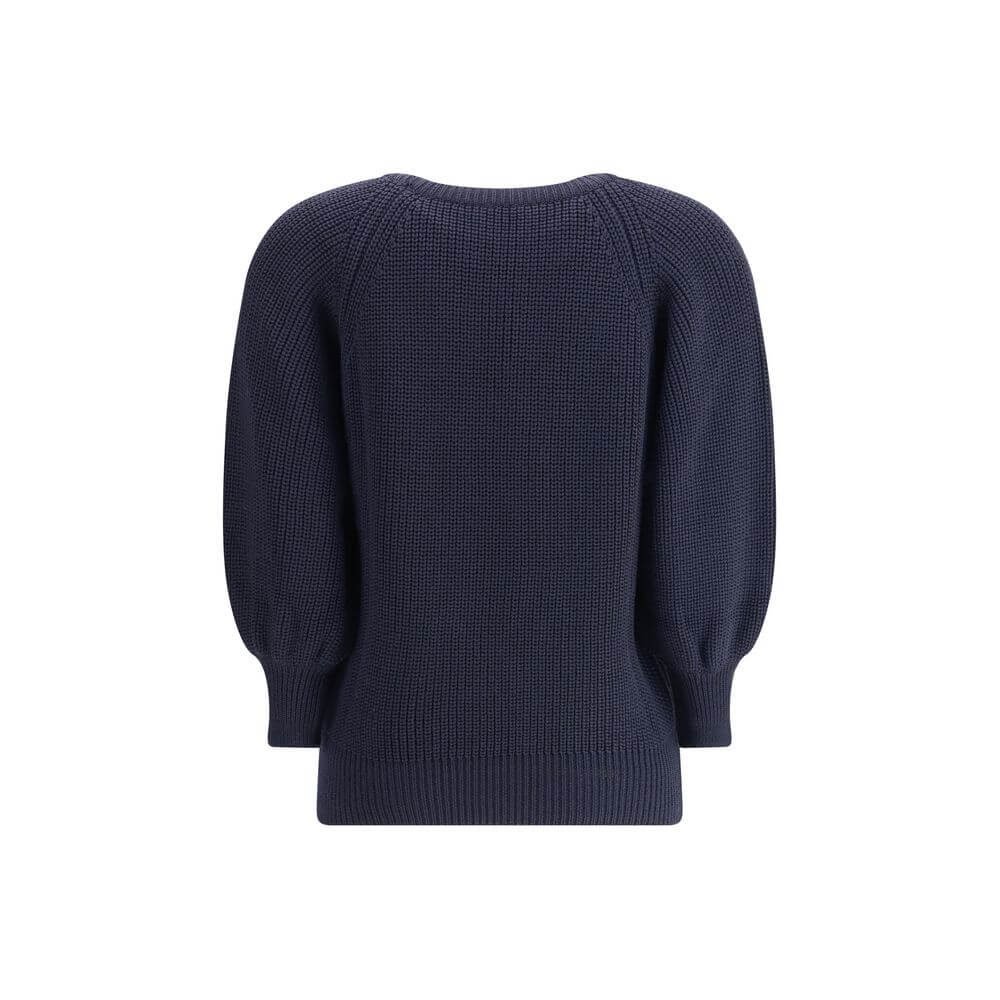 Back view of Ella Blue Merino Wool Sweater with a chunky knit and ribbed hem, perfect for cold weather. Season: AW25.