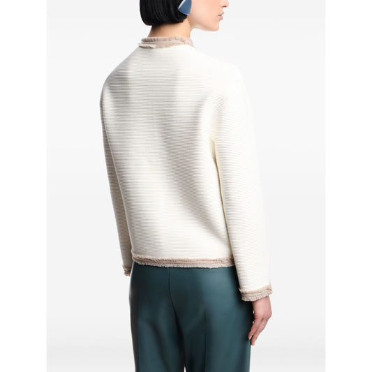 Rear view of a model wearing an Emporio Armani Jackets White with fringe trim and welt pockets, highlighting the back design of the blazer.