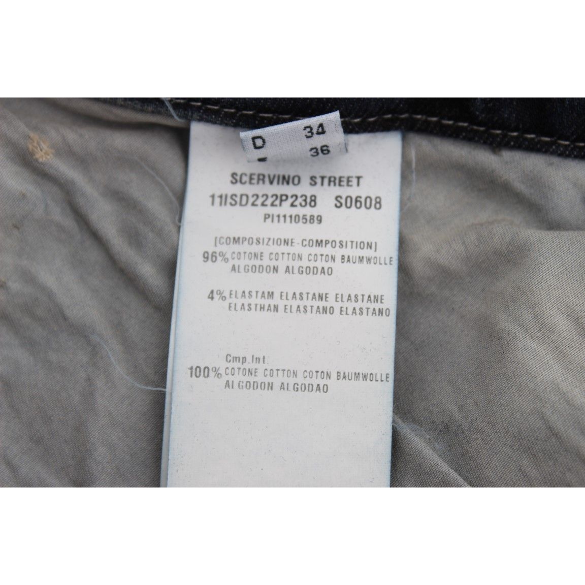 Label inside Ermanno Scervino Blue Cotton Blend Slim Fit Jeans showing material composition and size.