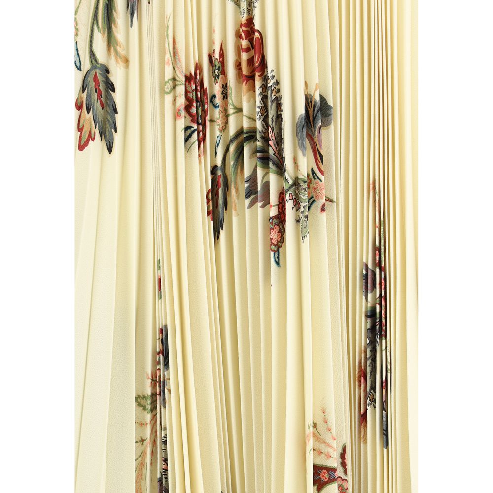 Close-up of Etro Yellow Polyester Midi Skirt with pleats and floral print, showcasing the signature romantic aesthetic in sablé fabric.