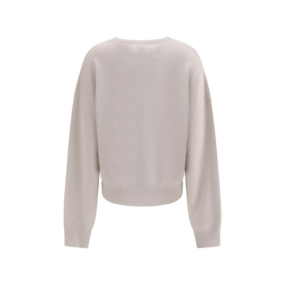 Back view of Extreme Cashmere Cream Cashmere Sweatshirt with crew neck and ribbed details, featuring soft and modern design for AW25.