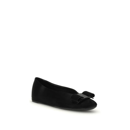 Ferragamo Black Calf Leather Bos Taurus Ballet Flats with Vara bow, showcasing elegance and versatility in soft leather design.