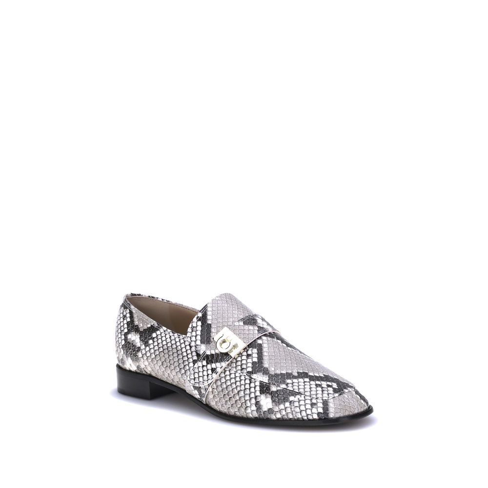 Ferragamo Multicolor Goatskin Slip-On Loafers with python print and golden metal detail, perfect for bold and sophisticated looks.