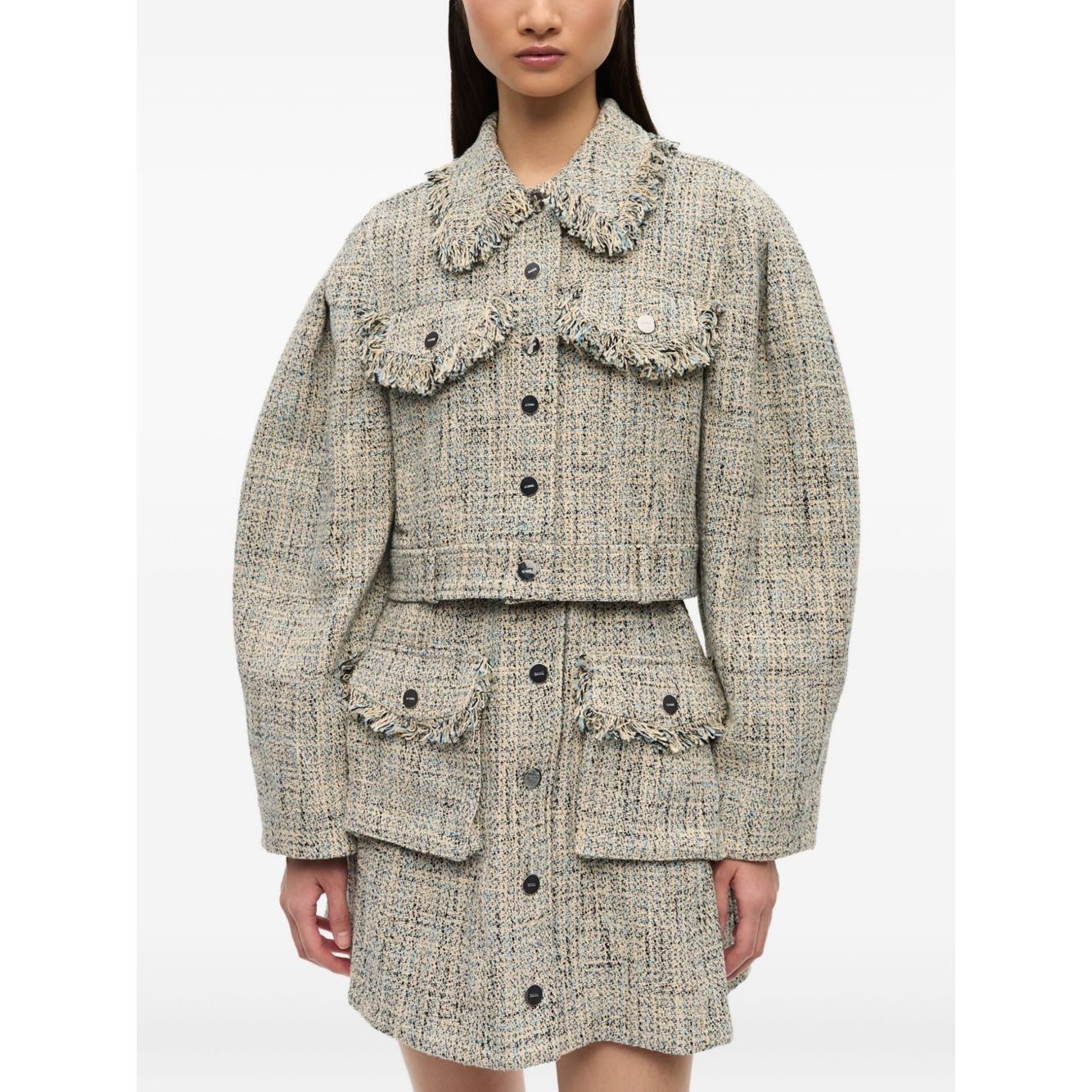 Woman wearing GANNI Jackets Beige with front button fastening, chest pockets, frayed detailing, and pointed flat collar.