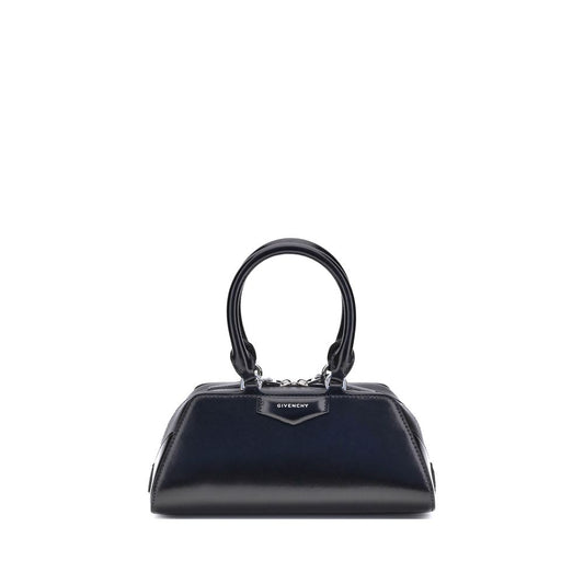 Givenchy Antigona East-West Mini Handbag with leather handles and embossed logo, showcasing elegant structured design.