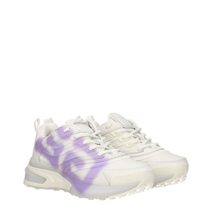White and lilac low top sneakers with lace-up closure, round toe, and rubber sole, featuring side and back logo details.