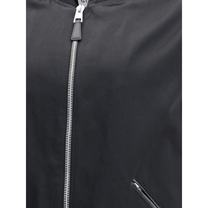 Close-up of Givenchy Black Cotton Bomber showing satin body and zipper details.