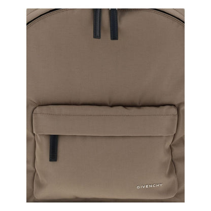 Givenchy Brown Polyamide Backpack with front zip pocket and metal GIVENCHY logo, featuring padded straps for comfort and style.