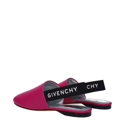 Givenchy Pink Leather Sandals with black side and back logos, round toe, and low flat heel in fuchsia and cyclamen colors.