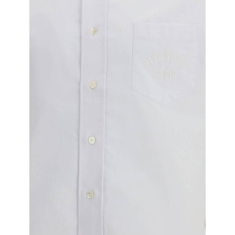 Close-up of Givenchy White Cotton Dress Shirt with embroidered pocket and button-down front, showcasing refined elegance for AW25.