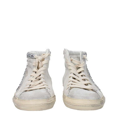 Golden Goose White Leather High Top Sneakers with aged and vintage effect, front and side logo, lace-up closure, and silver details.