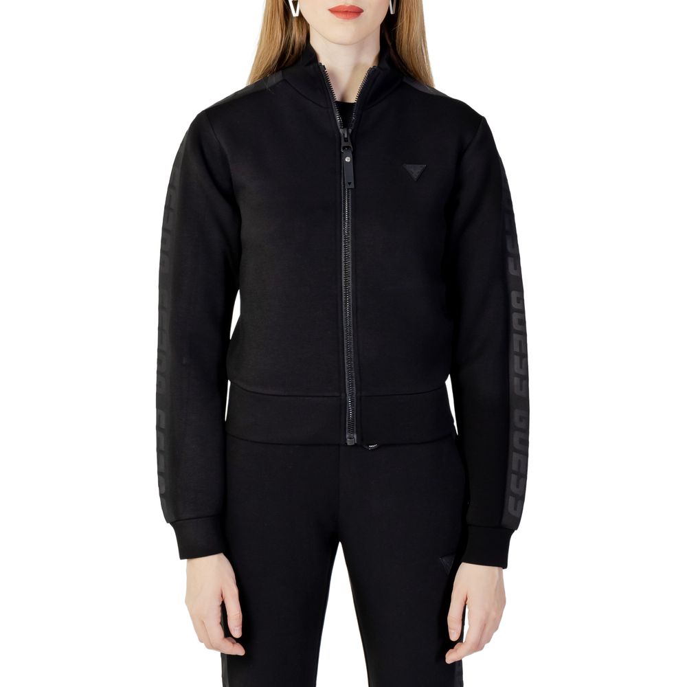 Woman wearing Guess Active Black Viscose Sweatshirt with zip, showcasing sporty and sleek design for everyday activities.