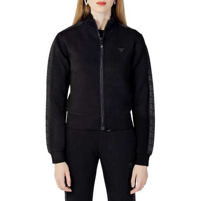 Woman wearing Guess Active Black Viscose Sweatshirt with zip, showcasing sporty and sleek design for everyday activities.
