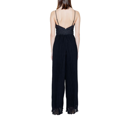 Rear view of Guess Black Polyester Jumpsuit with lace bodice and pleated trousers.