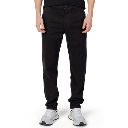 Hugo Boss Black Cotton Chino Pants, tapered fit men's trousers displayed on model, ideal for office or leisure, featuring stretch fabric.