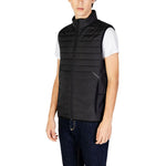 Man wearing Hugo Boss Black Polyester Sleeveless Jacket with quilted design, high collar, and front zip closure, offering modern style.