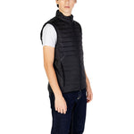 Hugo Boss Black Polyester Sleeveless Jacket on model showcasing quilted design and high collar.