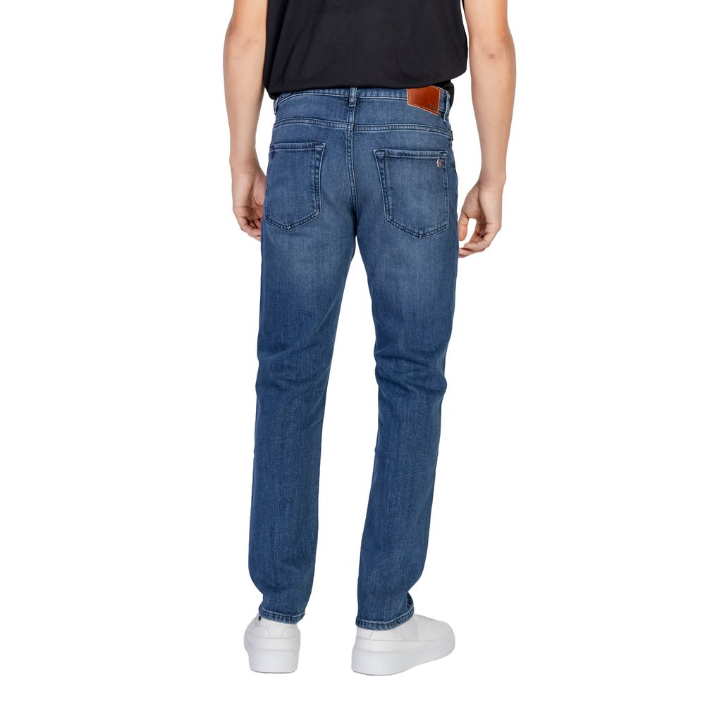 Back view of Hugo Boss Blue Cotton Relaxed Fit Jean on model, showcasing the regular and slightly loose fit for stylish comfort.