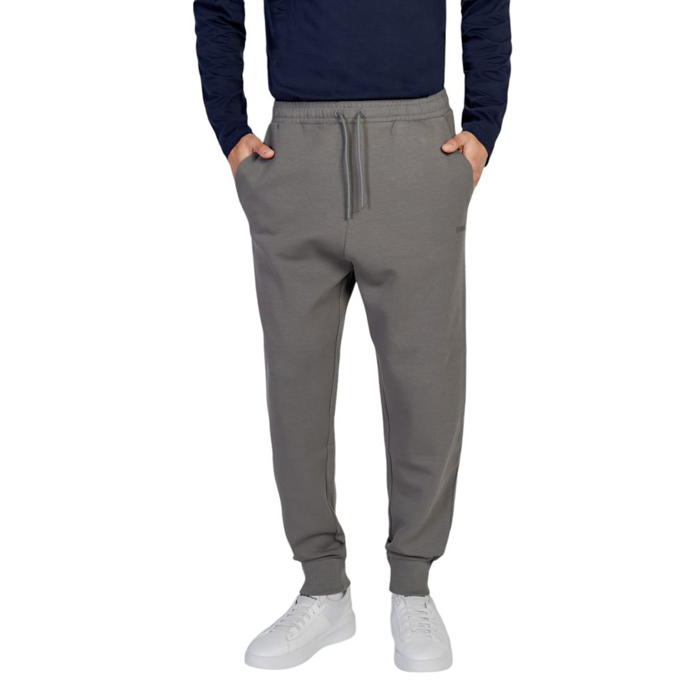 Hugo Boss Gray Cotton Joggers Workout Pant with elastic waistband, side pockets, and ribbed cuffs for men.