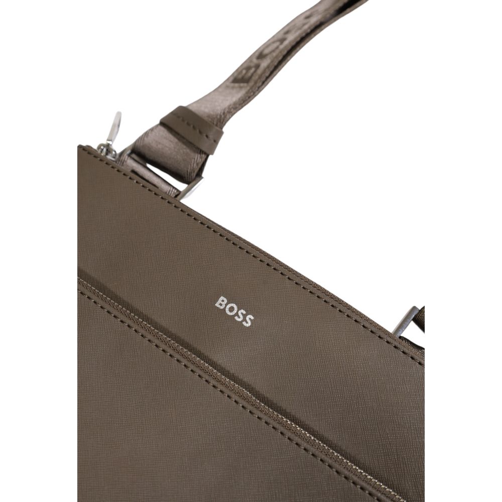 Close-up of the Hugo Boss Green Leather Messenger Bag with BOSS logo and adjustable strap detailing.