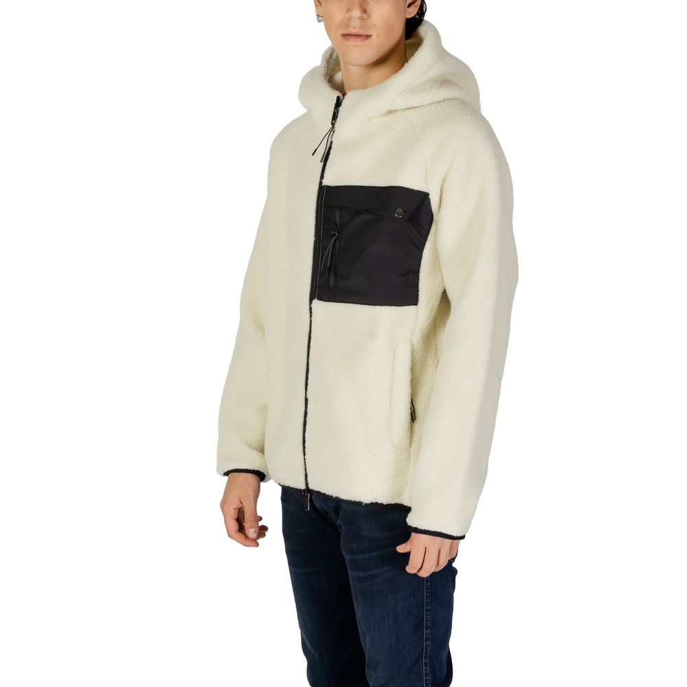 Man wearing Hydra Clothing Cream Polyester Jackets & Coat, featuring a hood and black chest pocket for fall/winter collection.