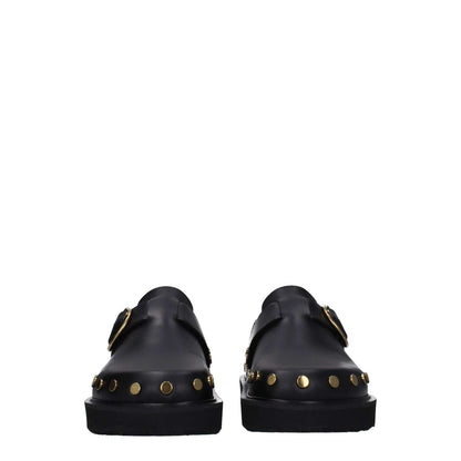 Isabel Marant Black Leather Slippers with gold studs, rubber sole, buckle closure, and round toe design.