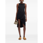 JACQUEMUS Dresses Black crew neck sleeveless asymmetric hem La Robe Peplo Courte dress on model, true to size fit.